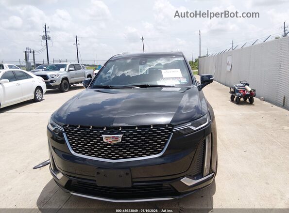 1GYKPCRS6PZ213724 2023 CADILLAC XT6 Black Widok wnętrza z tyłu