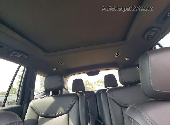 1GYKPCRS8SZ122849 2025 CADILLAC XT6 White Vista de los asientos traseros