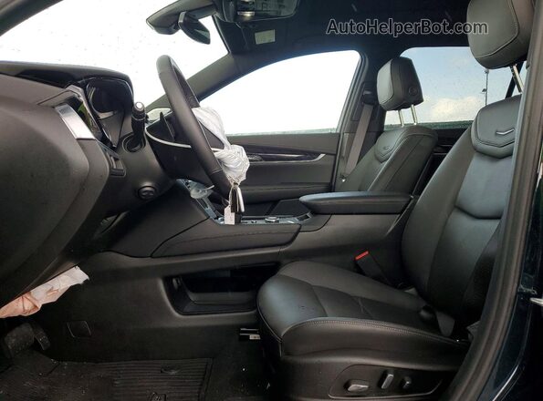 1GYKPDRSXSZ148357 2025 CADILLAC XT6 Бирюзовый Вид салона спереди
