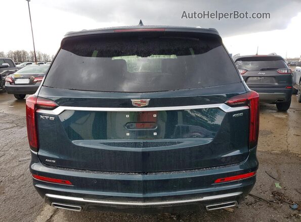 1GYKPDRSXSZ148357 2025 CADILLAC XT6 Бирюзовый Вид сзади