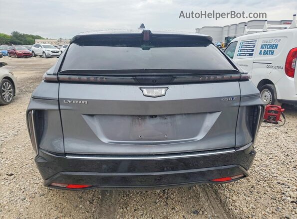 1GYKPMRK1PZ000945 2023 CADILLAC OTHER Серый Вид сзади