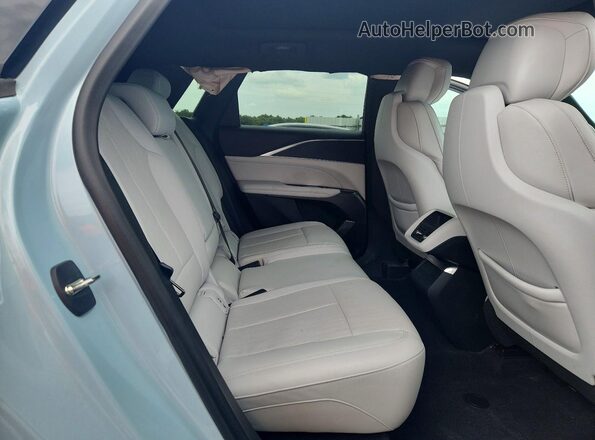 1GYKPPRK8RZ104644 2024 CADILLAC OTHER Turquoise Вид задньої частини салону