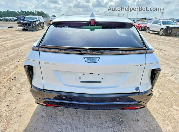 1GYKPVRK6RZ124492 2024 CADILLAC OTHER White Вид ззаду