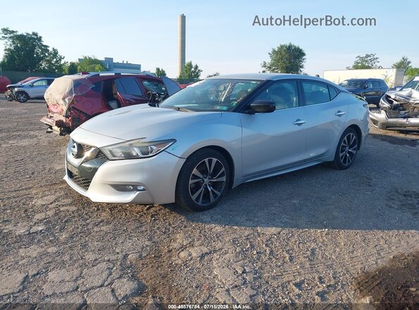 1N4AA6AP0HC447637 2017 NISSAN MAXIMA Серебряный Передняя левая четверть