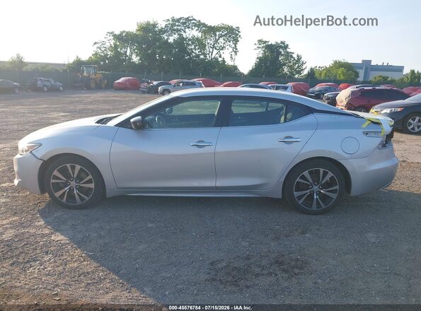 1N4AA6AP0HC447637 2017 NISSAN MAXIMA Серебряный Вид задней части салона