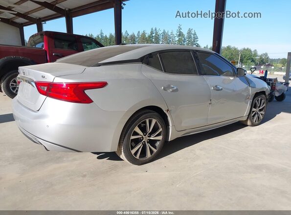 1N4AA6AP0JC386098 2018 NISSAN MAXIMA Серебряный Задняя правая четверть
