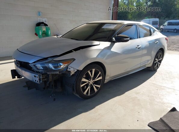 1N4AA6AP0JC386098 2018 NISSAN MAXIMA Серебряный Передняя левая четверть