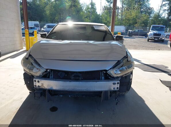 1N4AA6AP0JC386098 2018 NISSAN MAXIMA Серебряный Вид задней части салона