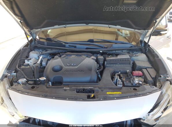 1N4AA6AP0JC386098 2018 NISSAN MAXIMA Серебряный Вид сзади