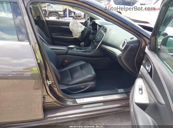 1N4AA6AP1GC402513 2016 NISSAN MAXIMA Коричневый Вид салона спереди