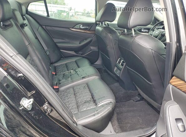 1N4AA6AP1JC372517 2018 NISSAN MAXIMA Black Rear seats view
