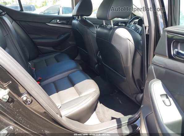 1N4AA6AP1JC409324 2018 NISSAN MAXIMA Black Vista de la etiqueta del VIN