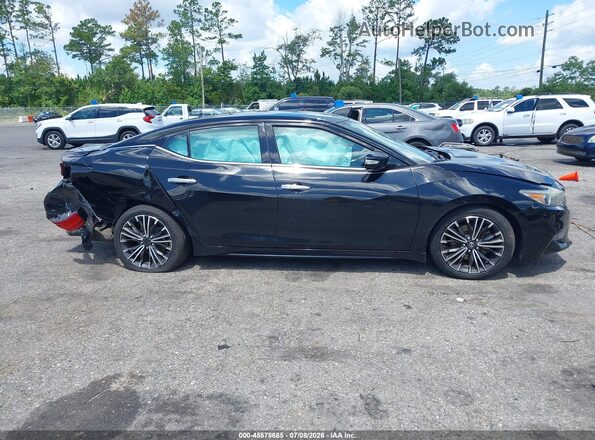 1N4AA6AP1JC409324 2018 NISSAN MAXIMA Black Vista interior trasera
