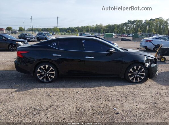 1N4AA6AP2GC387200 2016 NISSAN MAXIMA Черный Вид задней части салона