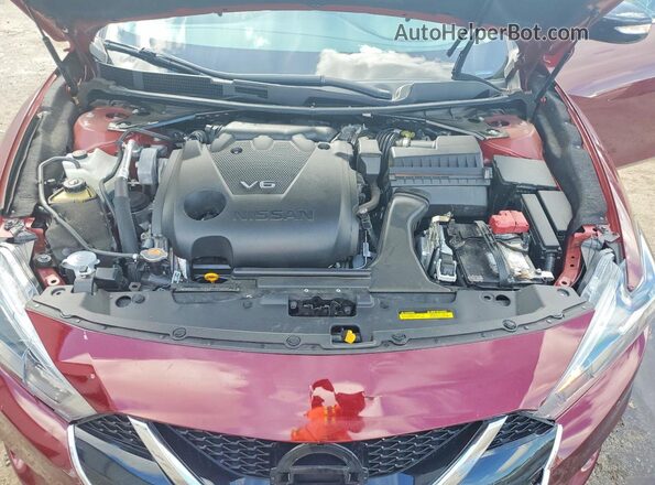 1N4AA6AP2JC383557 2018 NISSAN MAXIMA Maroon Rear interior view