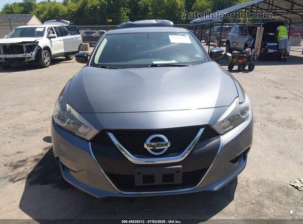 1N4AA6AP5JC373265 2018 NISSAN MAXIMA Gray Widok wnętrza z tyłu