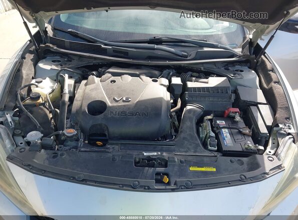 1N4AA6AP6JC380418 2018 NISSAN MAXIMA Silver Widok z tyłu