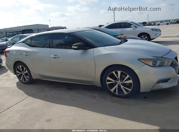 1N4AA6AP6JC380418 2018 NISSAN MAXIMA Silver Widok wnętrza z tyłu