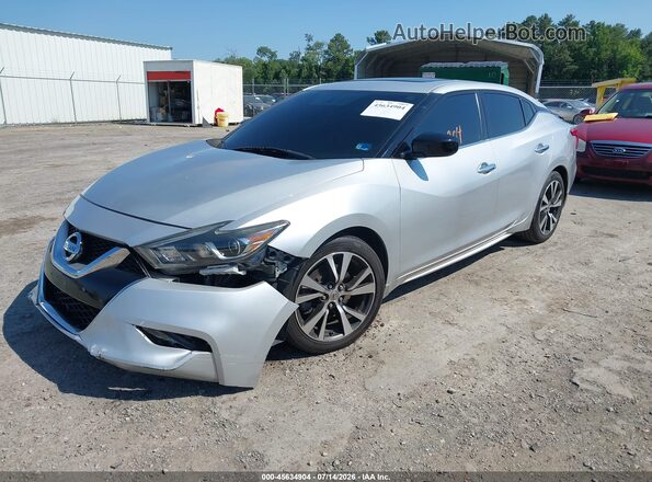 1N4AA6AP7GC389962 2016 NISSAN MAXIMA Серебряный Передняя левая четверть