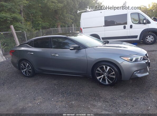 1N4AA6AP7JC375230 2018 NISSAN MAXIMA Gray Rear interior view