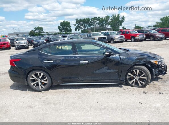1N4AA6AP7JC390651 2018 NISSAN MAXIMA Черный Вид задней части салона