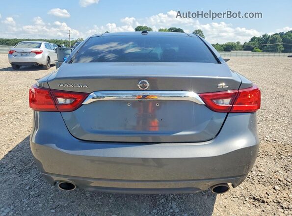 1N4AA6AP9JC377500 2018 NISSAN MAXIMA Silver Rear view