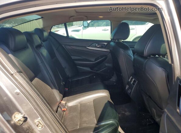 1N4AA6AP9JC377500 2018 NISSAN MAXIMA Silver Rear seats view