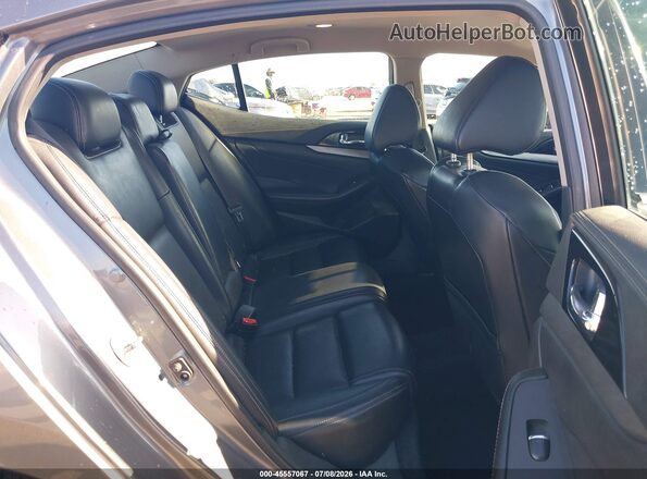 1N4AA6AP9JC387086 2018 NISSAN MAXIMA Gray Vista de la etiqueta del VIN