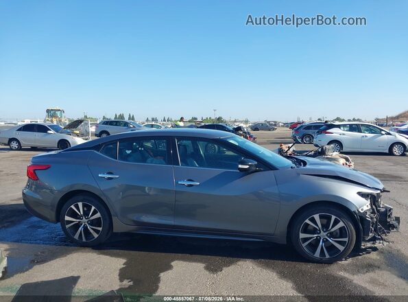 1N4AA6AP9JC387086 2018 NISSAN MAXIMA Gray Vista interior trasera