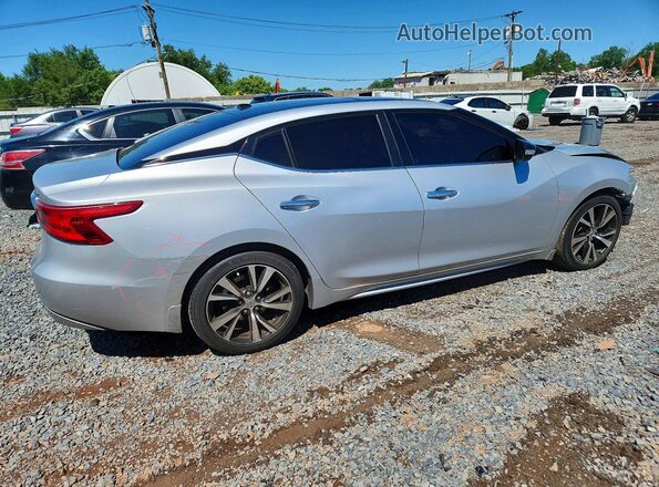 1N4AA6AP9JC395477 2018 NISSAN MAXIMA Серебряный Задняя правая четверть