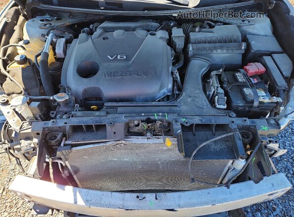 1N4AA6AP9JC395477 2018 NISSAN MAXIMA Серебряный Вид задней части салона