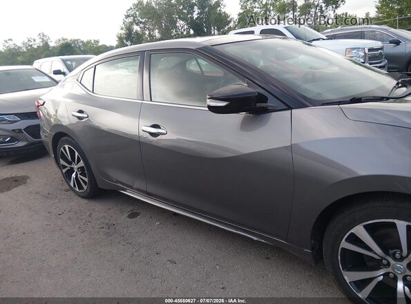 1N4AA6AP9JC402010 2018 NISSAN MAXIMA Gray Rear interior view