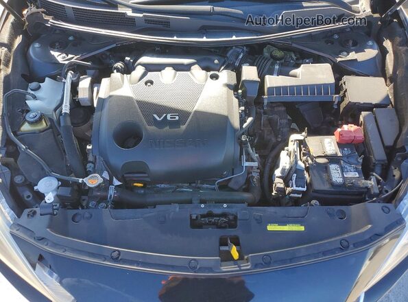 1N4AA6APXHC411132 2017 NISSAN MAXIMA Черный Вид задней части салона