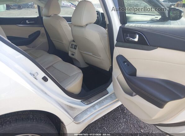 1N4AA6AV2KC377192 2019 NISSAN MAXIMA White Vista de la etiqueta del VIN