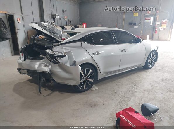 1N4AA6CV4PC512161 2023 NISSAN MAXIMA Серебряный Задняя правая четверть