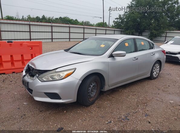 1N4AL3AP0GC155008 2016 NISSAN ALTIMA Silver Vista tres cuartos delantera izquierda