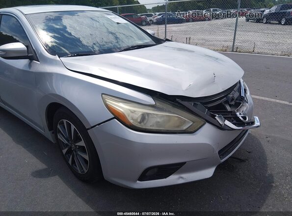 1N4AL3AP1GC140789 2016 NISSAN ALTIMA Silver Вид задньої частини салону