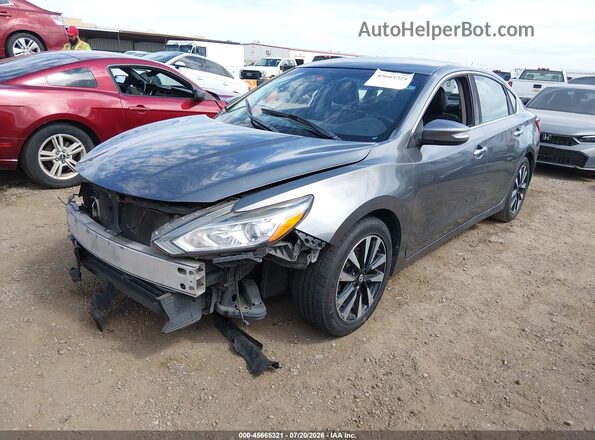 1N4AL3AP1JC242603 2018 NISSAN ALTIMA Gray Vista tres cuartos delantera izquierda