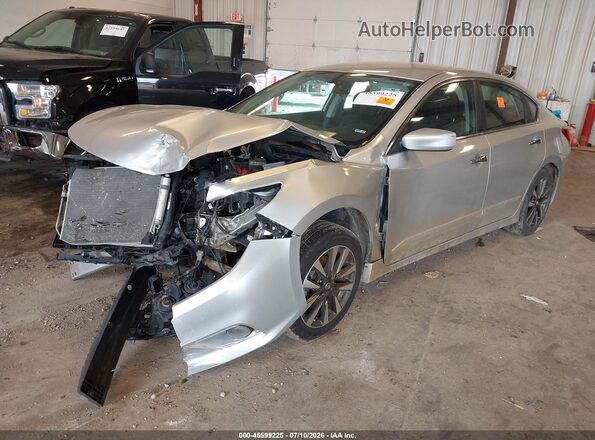 1N4AL3AP3GC170490 2016 NISSAN ALTIMA Silver Vista tres cuartos delantera izquierda