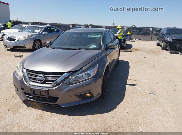 1N4AL3AP4HC123163 2017 NISSAN ALTIMA Gray Vista tres cuartos delantera izquierda