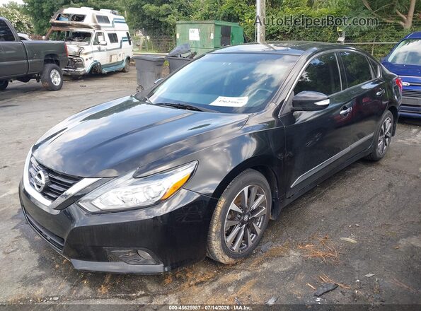 1N4AL3AP5GC137863 2016 NISSAN ALTIMA Black Vista tres cuartos delantera izquierda