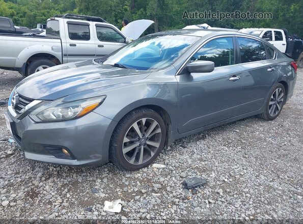 1N4AL3AP5GN319812 2016 NISSAN ALTIMA Silver Przód lewy