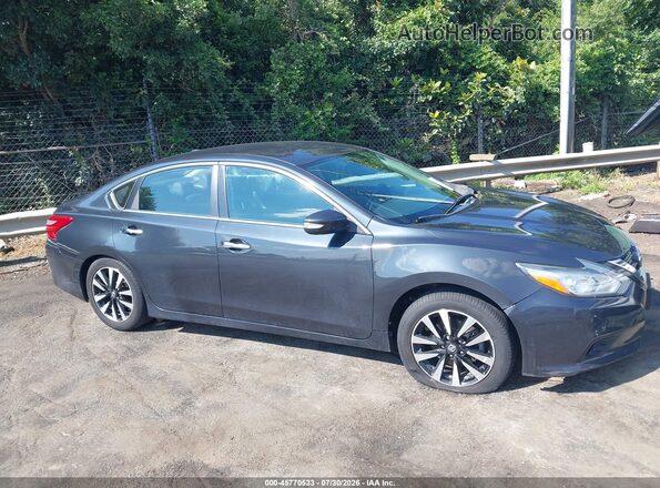 1N4AL3AP5JC146909 2018 NISSAN ALTIMA Gray Vista interior trasera