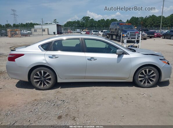 1N4AL3AP6JC207359 2018 NISSAN ALTIMA Серебряный Вид задней части салона