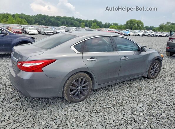 1N4AL3AP7GC128839 2016 NISSAN ALTIMA Silver Trasero derecho