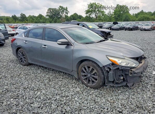 1N4AL3AP7GC128839 2016 NISSAN ALTIMA Silver Delantero derecho