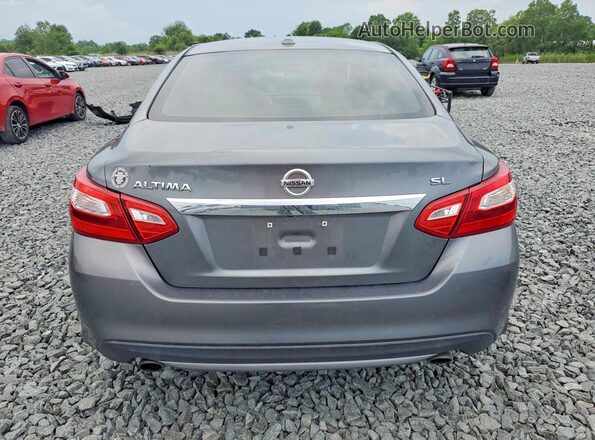 1N4AL3AP7GC128839 2016 NISSAN ALTIMA Silver Vista trasera