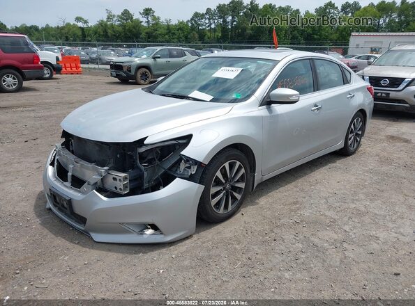 1N4AL3AP7GC154969 2016 NISSAN ALTIMA Silver Vista tres cuartos delantera izquierda
