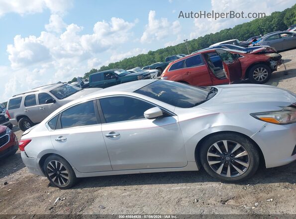 1N4AL3AP7JC199711 2018 NISSAN ALTIMA Серебряный Вид задней части салона