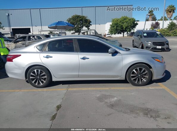 1N4AL3AP7JC247496 2018 NISSAN ALTIMA Silver Vista interior trasera